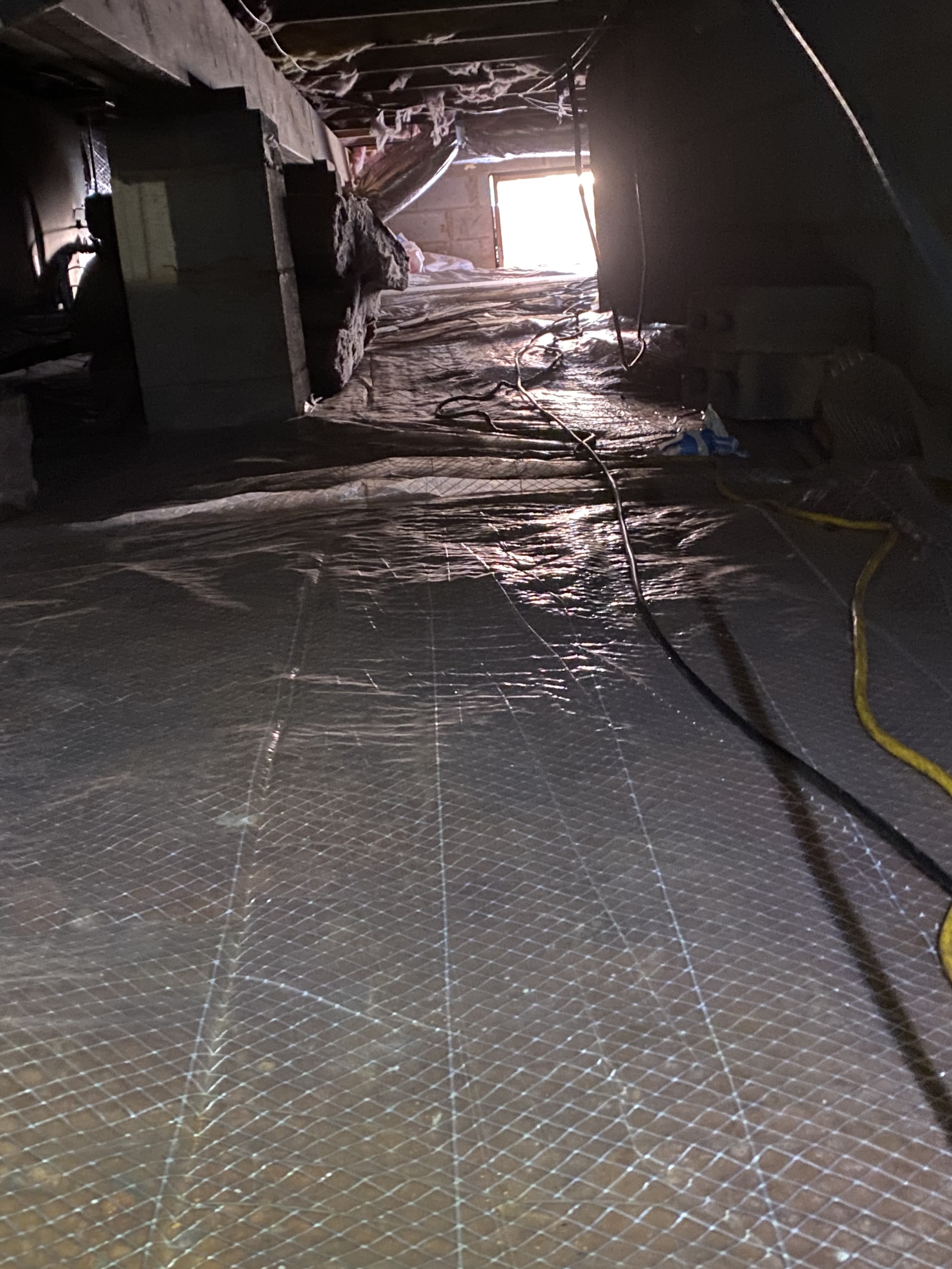 Crawlspace vapor barrier installation and moisture control